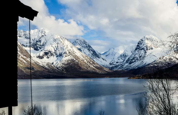 Snow-covered mountains seen from the terrace in winter