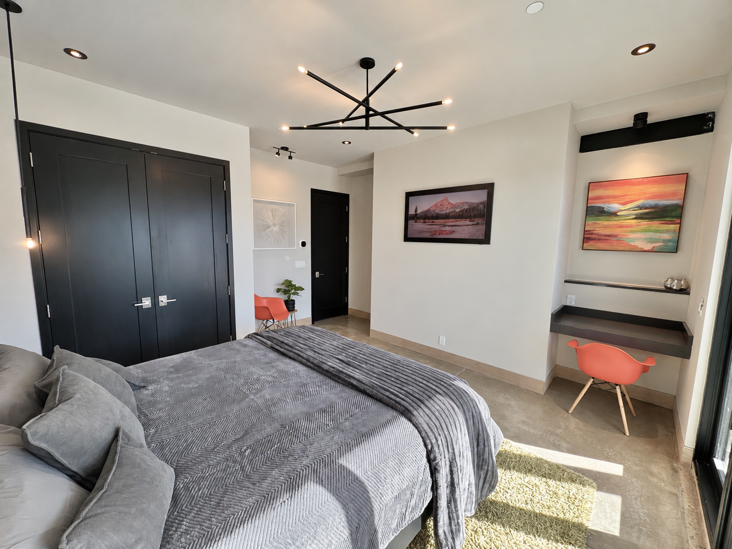 Fourth king bedroom with desk and storage.