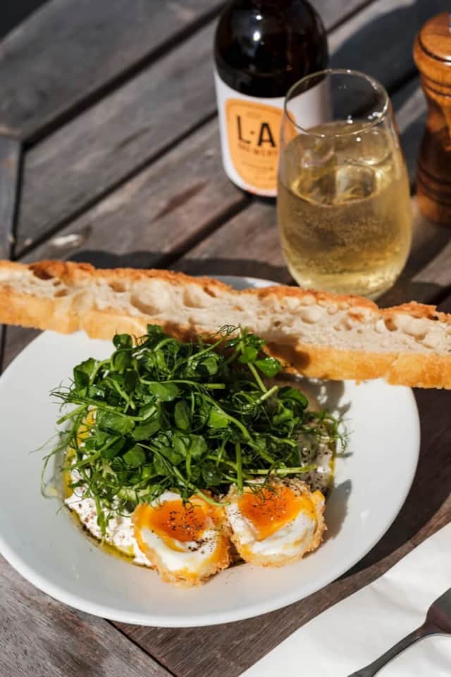 Brunch with eggs, greens and bread at Glenforsa Café on Mull
