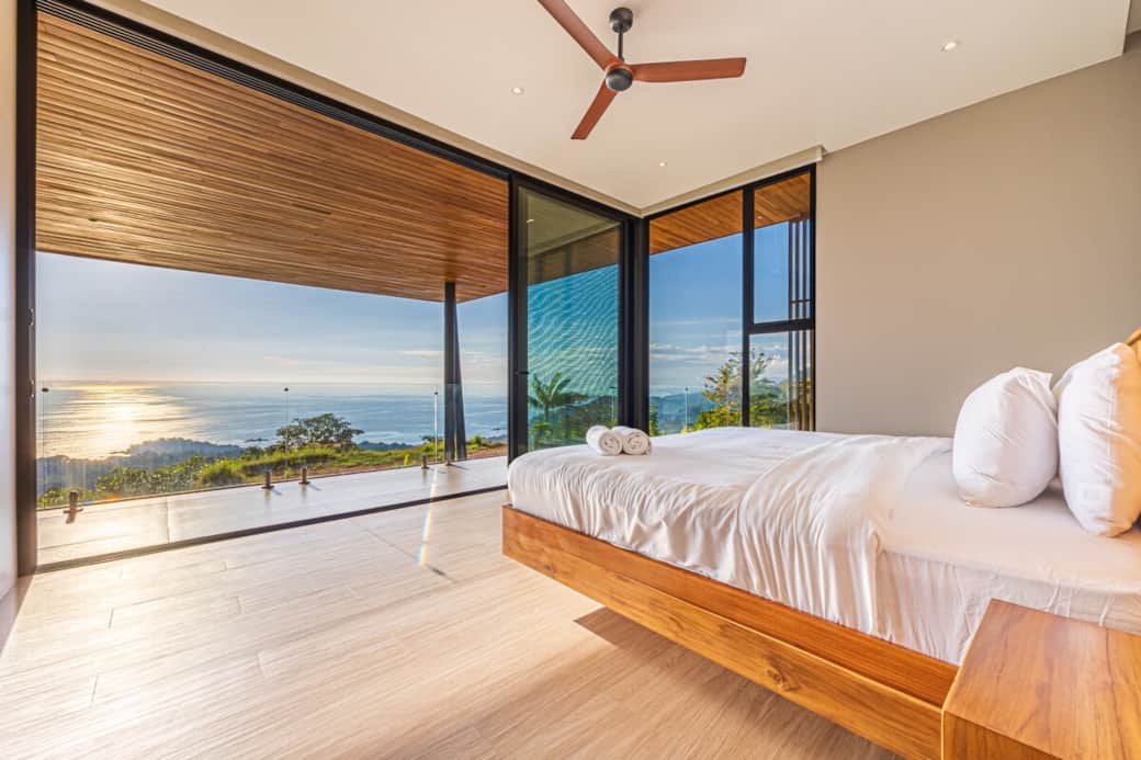 Master bedroom with ocean  view. En-suite comes with bathroom (Indoor  , outdoor  , and Bathtub  )
