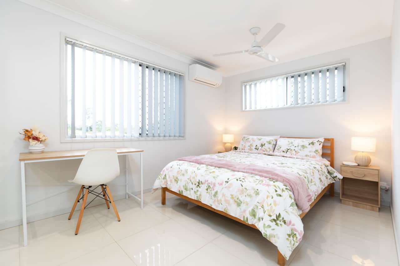 Bedroom: Peaceful bedroom with cozy design and ample storage 