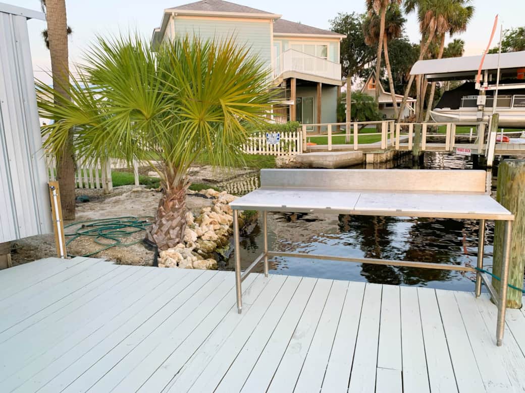 Dock area nearest boat ramp with fish cleaning table