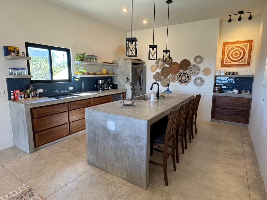 A fully stocked kitchen that has it all: large sink, blender, dishwasher, and easy-access drawers fo A fully stocked kitchen that has it all: large sink, blender, dishwasher, and easy-access drawers fo