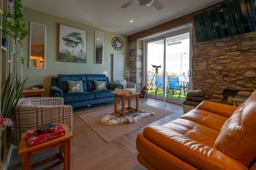 Open-plan living space with sea views