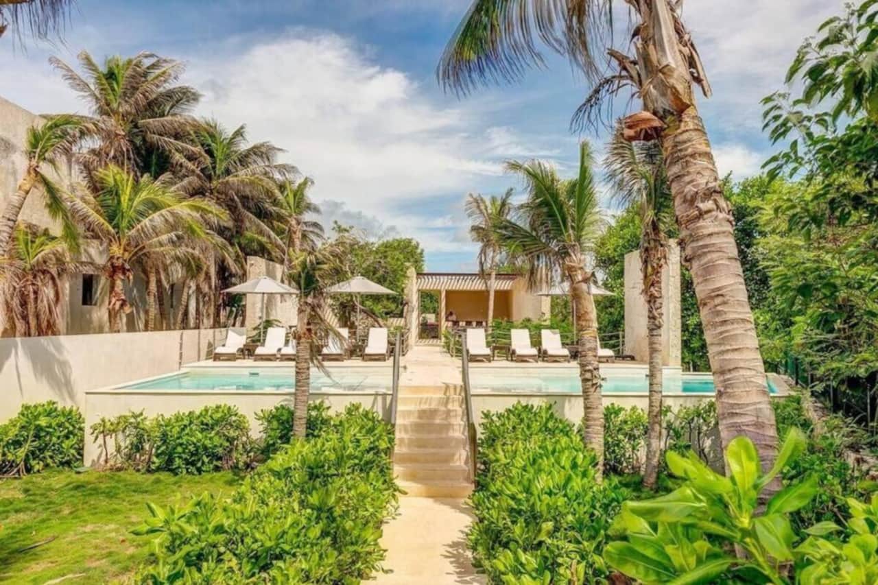 Indulge in Santamar Beach Club's exclusive paradise, luxury, and leisure.