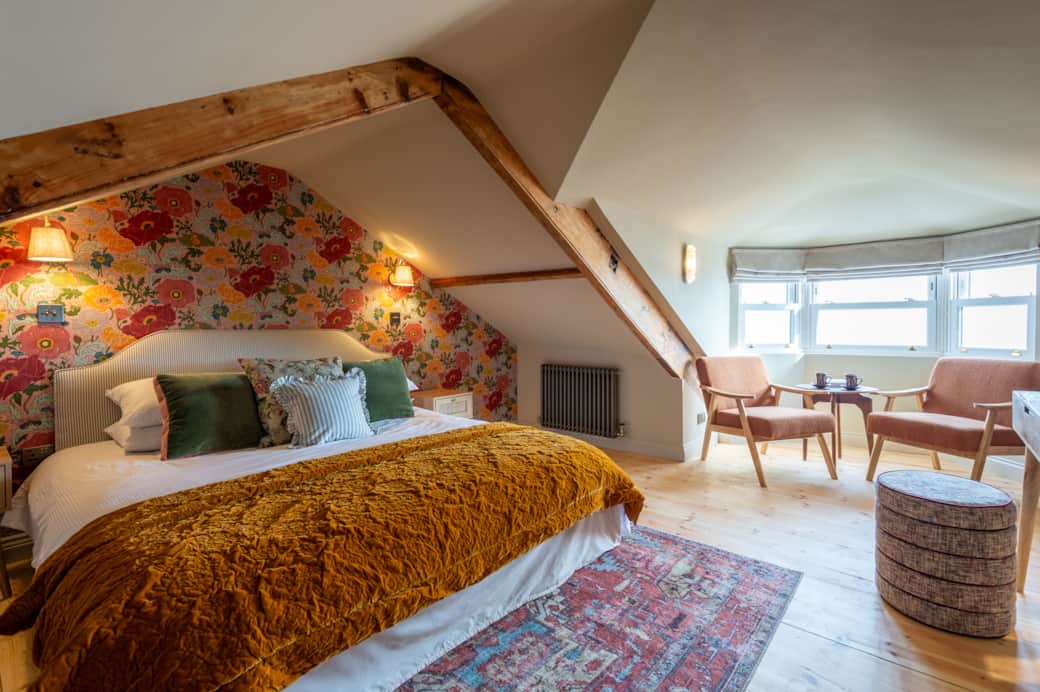 Enjoy breathtaking sea views from the comfort of your elegant, light-filled suite.