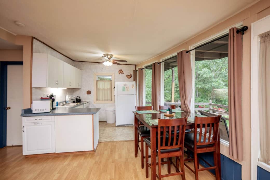 kitchen and dining area, dining table seats 4 
(4 TV tray tables available as well)