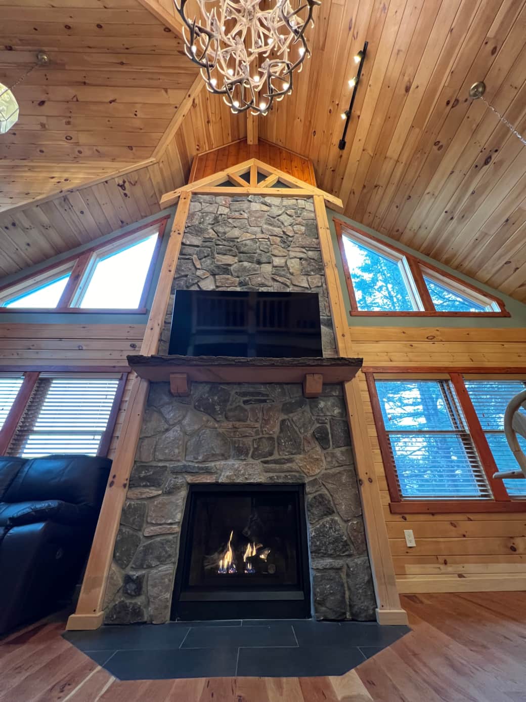 Propane fireplace with 65 inch Samsung QLED TV