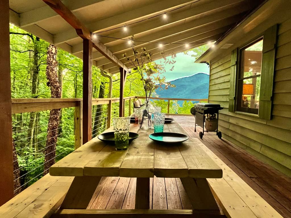 Step right outside the kitchen onto the covered deck and enjoy a meal at the picnic table.