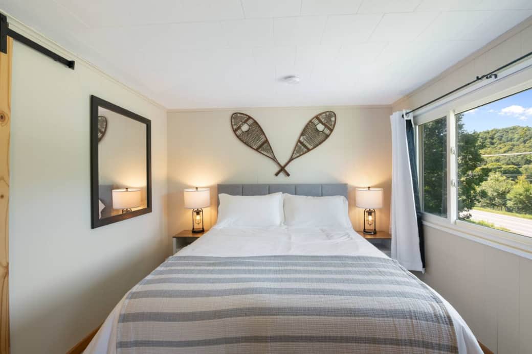 Unit 1 Front queen bedroom with blackout shades