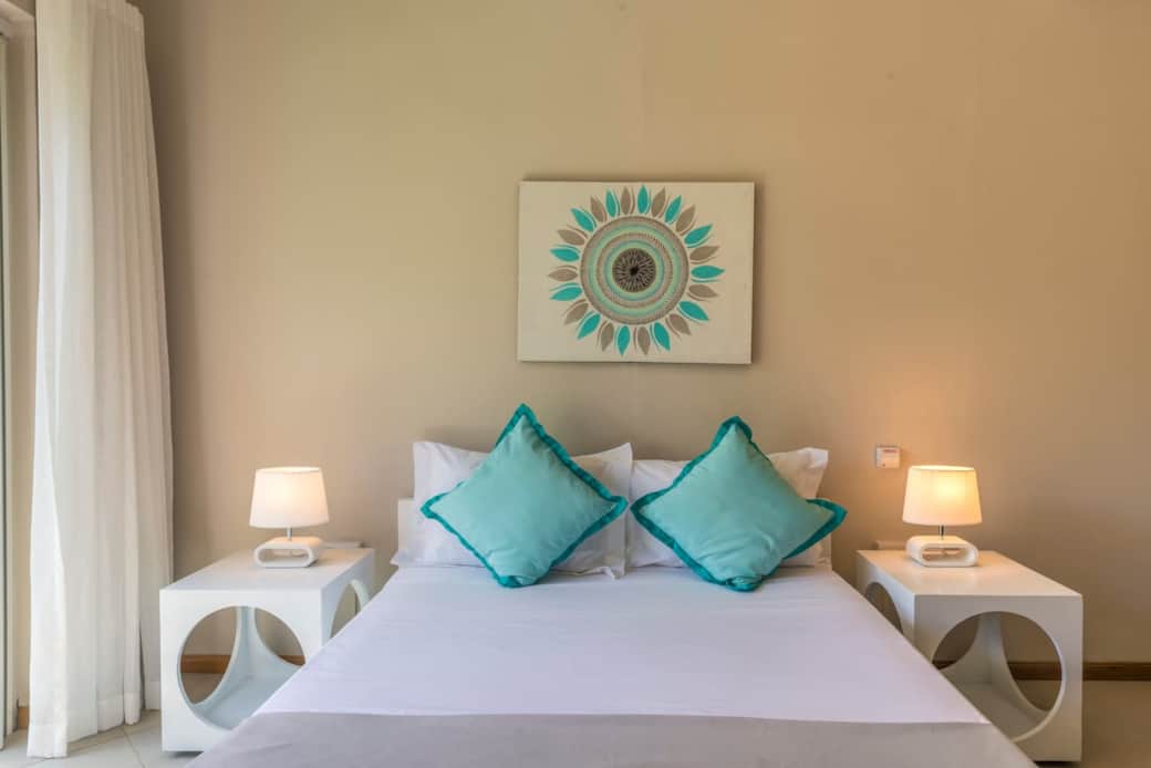 Comfortable and spacious bedroom with A/C and fan, ensuite bathroom Comfortable and spacious bedroom with A/C and fan, ensuite bathroom