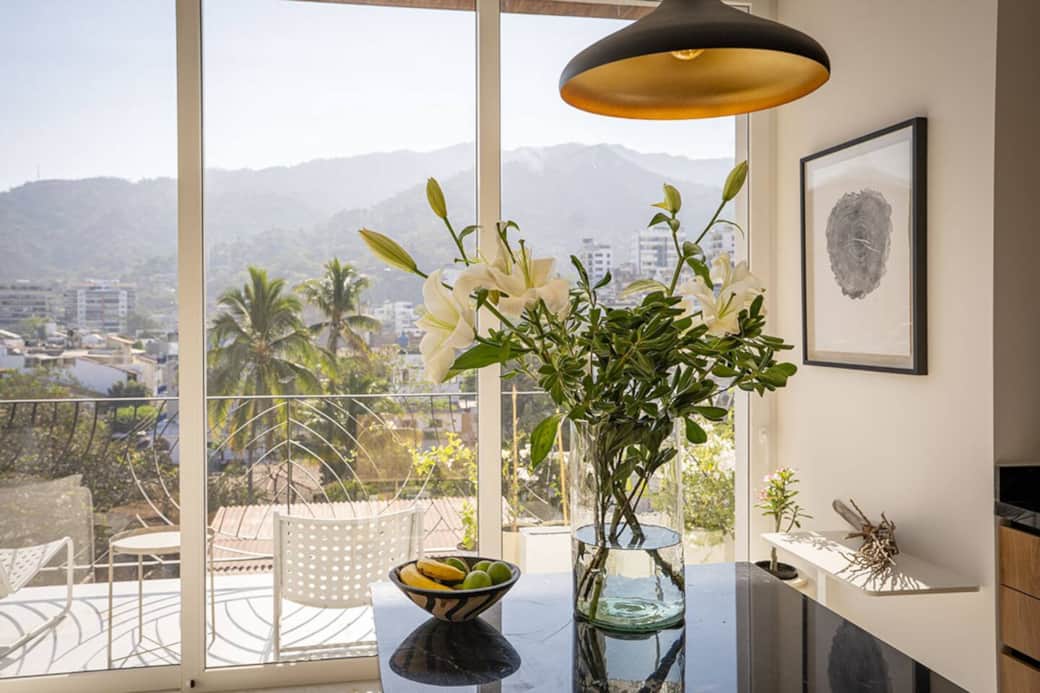 Kitchen island with flowers and local fruits Kitchen island with flowers and local fruits
