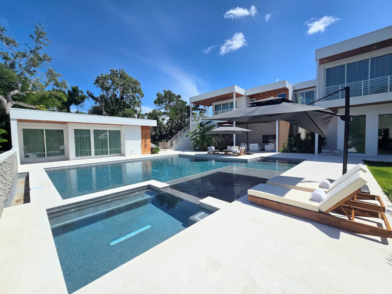 Luxury Siesta Key Home View of Spa and Sun Shelf in Oversized Saltwater Pool