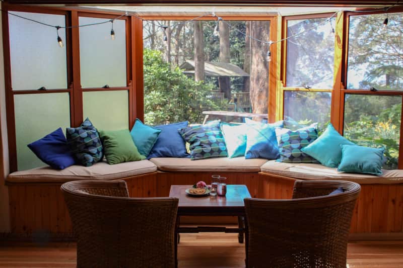 Studio Breathe at Tomah Retreat, with a bay window seat looking over the mountains