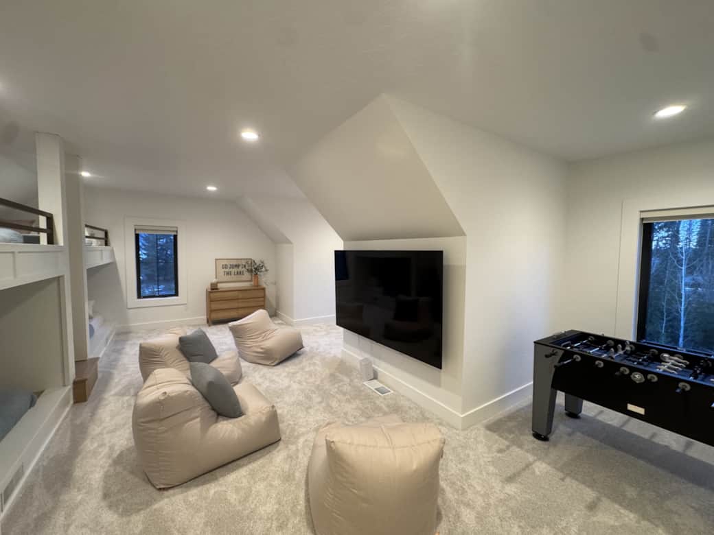 Loft bunk room with games and tv