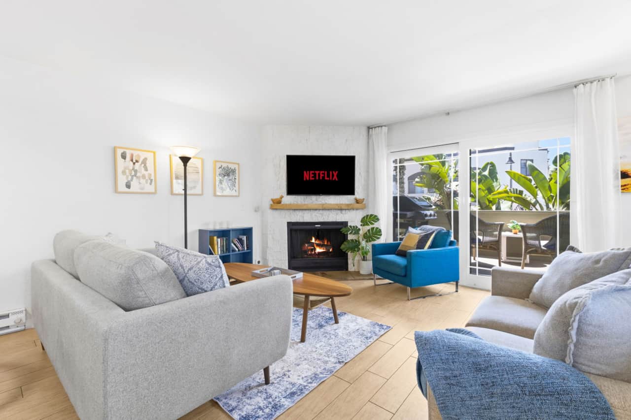 Living Area - Smart TV & Fireplace- Access to Balcony
