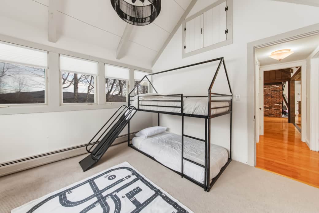 Fun bunk room with slide — a favorite for kids