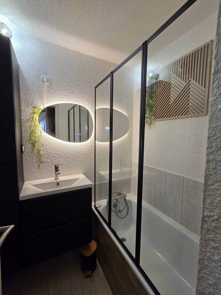 Paroi de douche pliante inspiration verrière