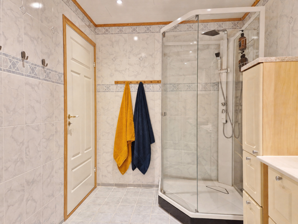 Bathroom with a large shower