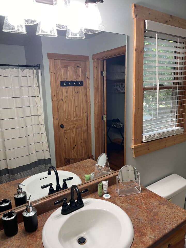 Master bath with hairdryer, towels, essentials
