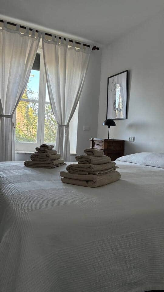 Casa Bougainville double bedroom with natural light in Gaeta