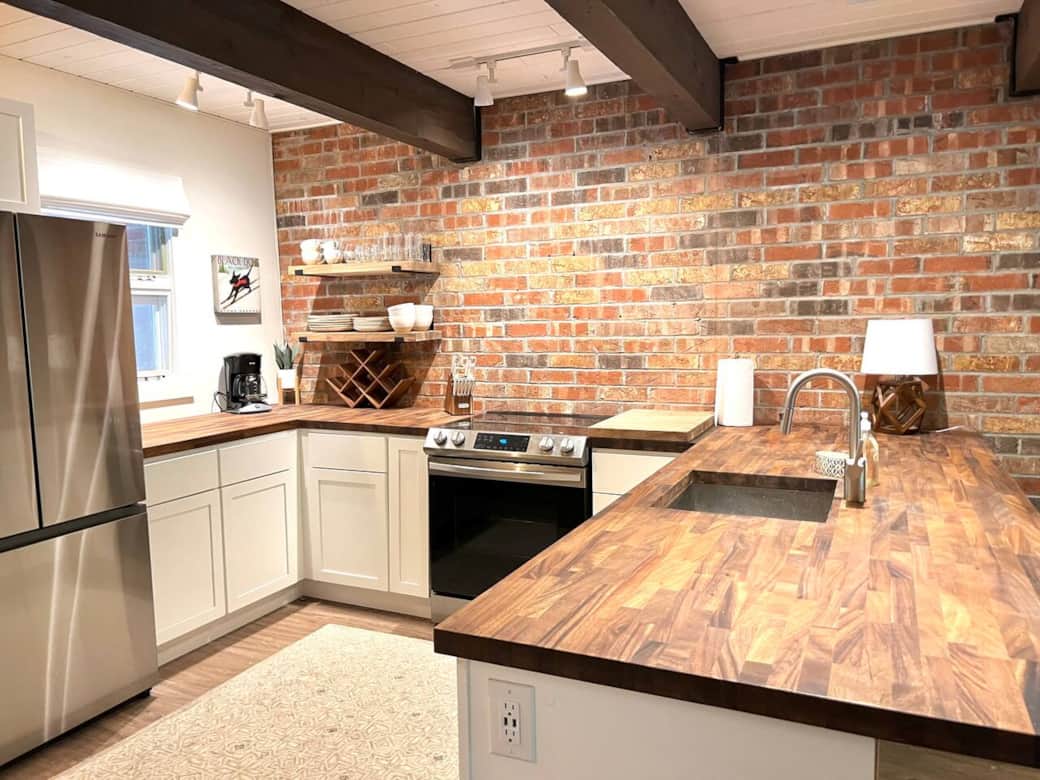 Kitchen is open and spacious enough for having plenty of meals at home. 