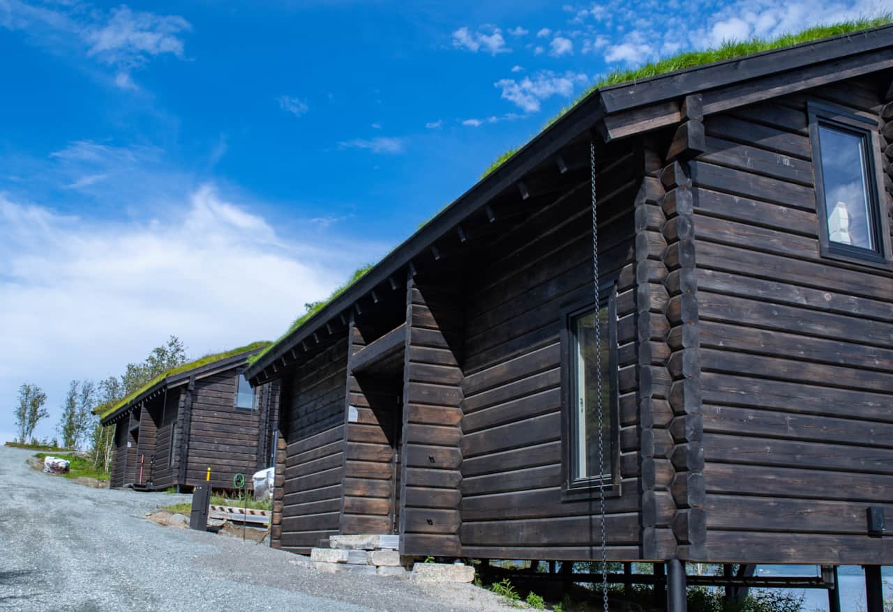 A turf-roofed cabin above the fjord, 67 km from Tromsø.