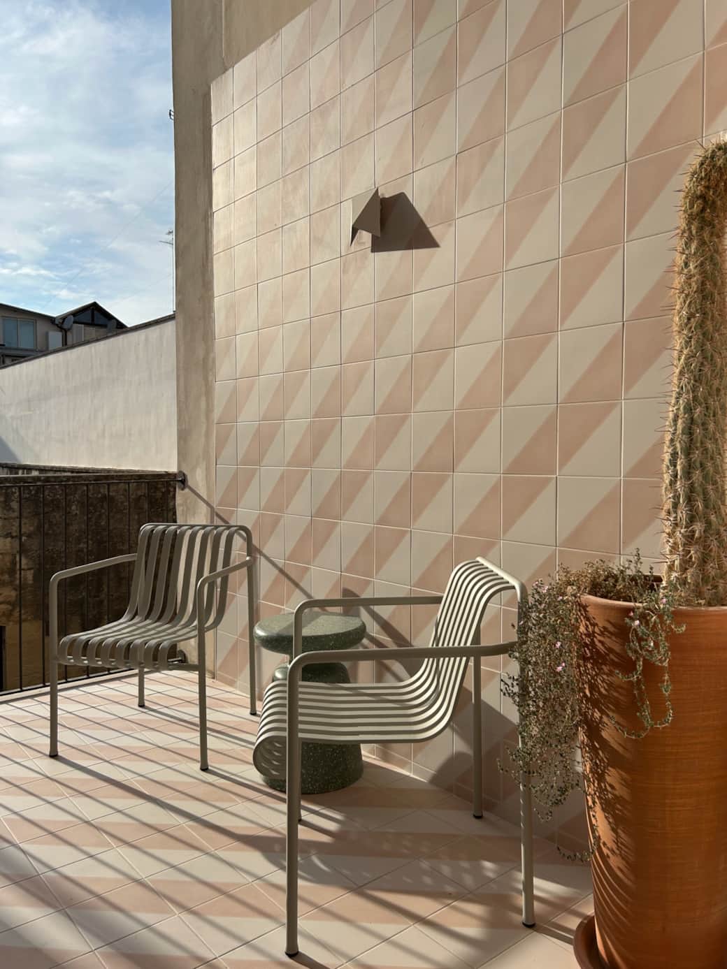 The striking tiled balcony in the bedroom is the perfect place for quiet coffee moment