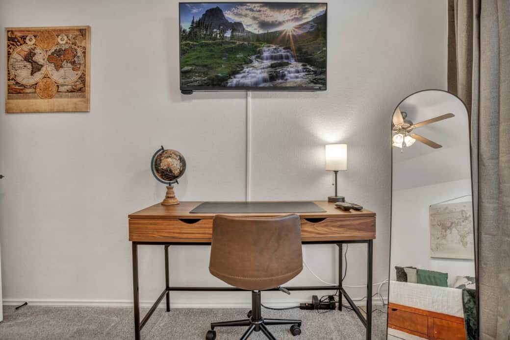 Lovely workspace with access to the modem for a hard line hook-up if required. Comfortable, leather swivel chair, desk lamp, desk drawers, and plenty of outlet space to plug in your devices. The room also has a 50" flat screen TV and Roku device. Lovely workspace with access to the modem for a hard line hook-up if required. Comfortable, leather swivel chair, desk lamp, desk drawers, and plenty of outlet space to plug in your devices. The room also has a 50" flat screen TV and Roku device.