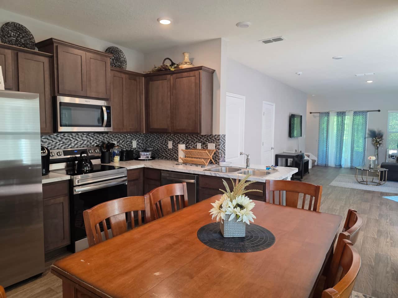 Fully equipped kitchen has modern appliances, cookware.  Everything needed for short or long stays.