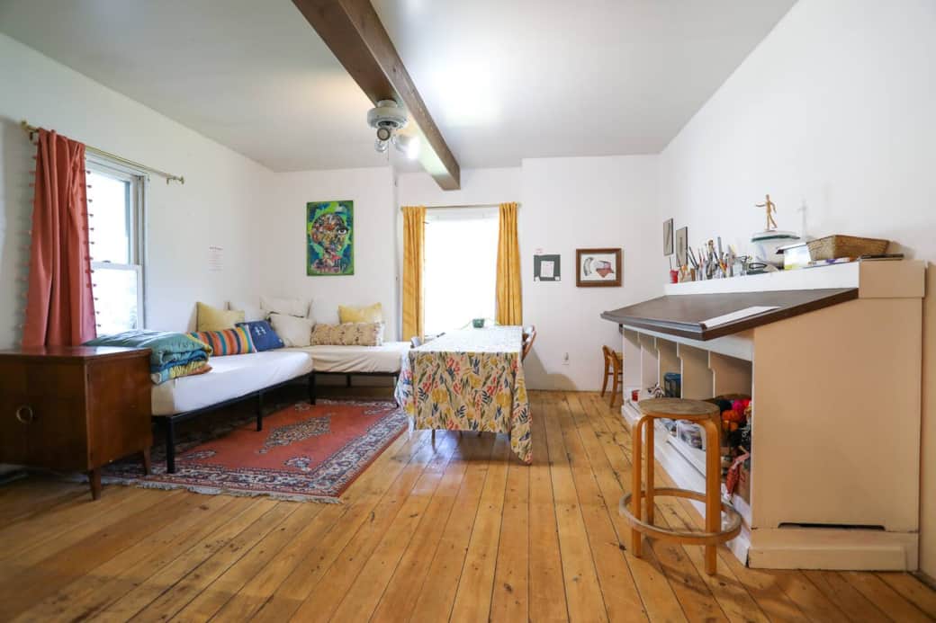 Our art studio has two day beds for extra sleeping space. It can also accommodate extra air mattresses. This is a fun space for kids and artists to make a mess in. 