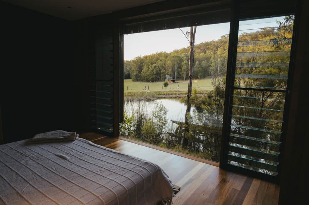 Master bedroom views overlooking the pond