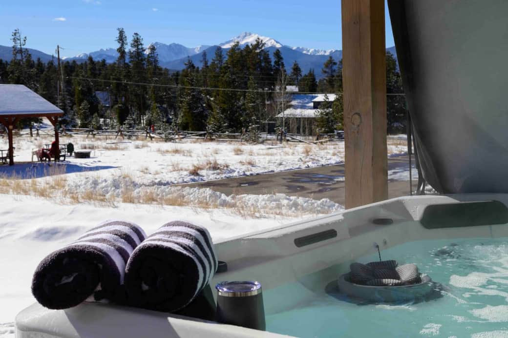 Enjoy the breath-taking views of the Rocky Mountains + Byers Peak while soaking your muscles! Hot tub towels and stainless steal drinkware is provided.