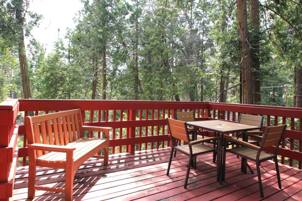 Forest views surround the second level deck