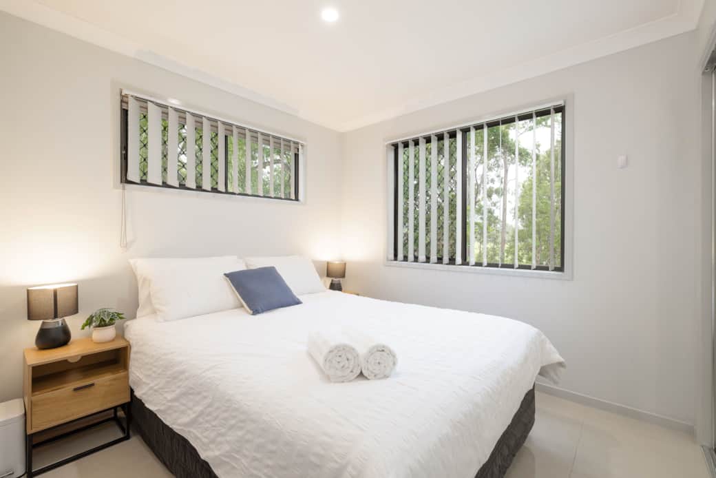 Bedroom 1: Peaceful bedroom with cozy design and ample storage