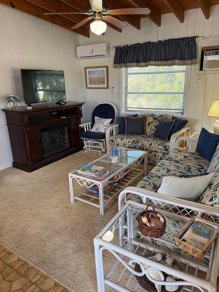 Comfy living room with smart tv and cozy electric fireplace