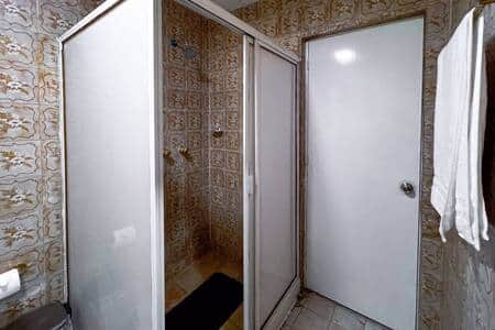 Private Shower: Ensuite bathroom with a spacious shower for your privacy and comfort.