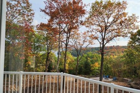 Your view from inside the living room,  looking over the property and the lake