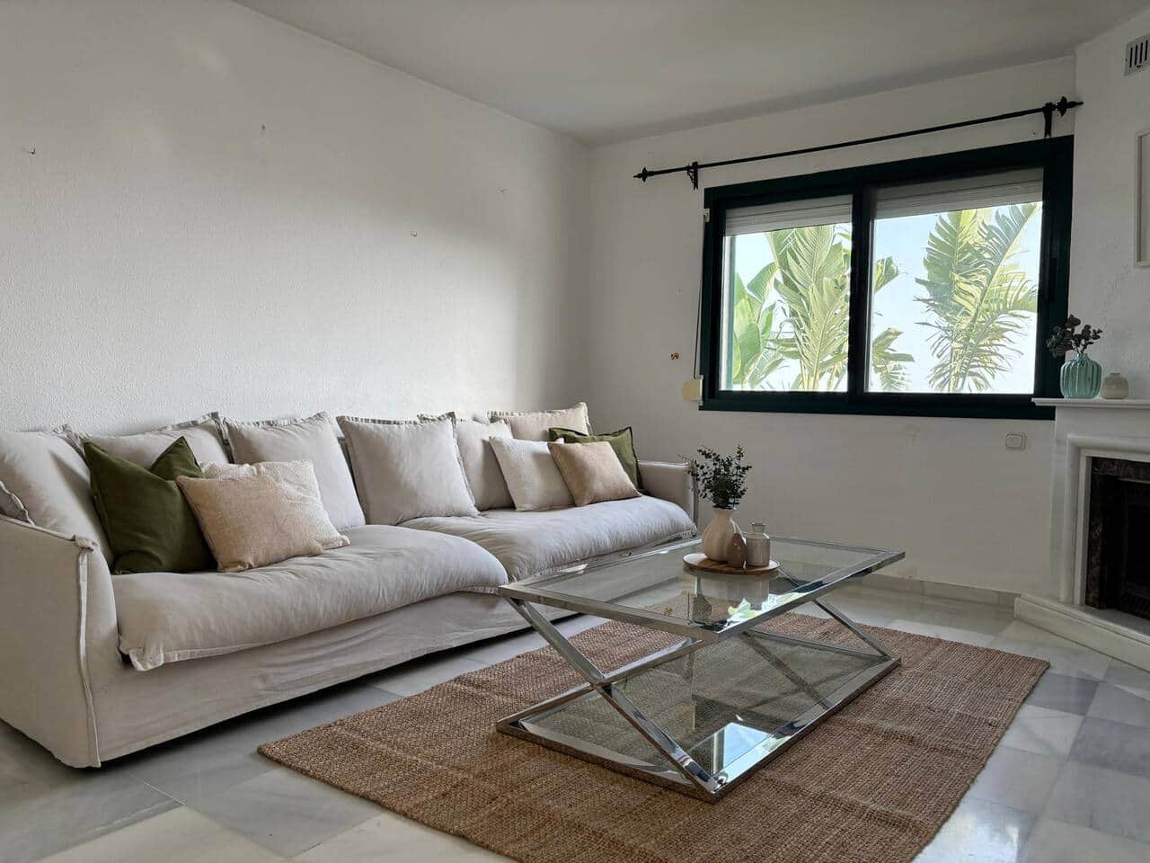 Enjoy a bright open living space with a cosy fireplace, Smart TV and comfortable seating, ideal for 