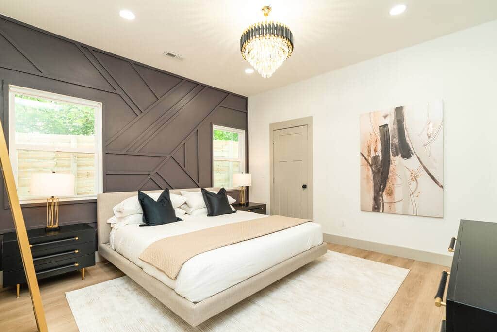Master Bedroom with King Bed/walk in closet. 65 inch Roku TV with modern decor and accent wall. Master Bedroom with King Bed/walk in closet. 65 inch Roku TV with modern decor and accent wall.
