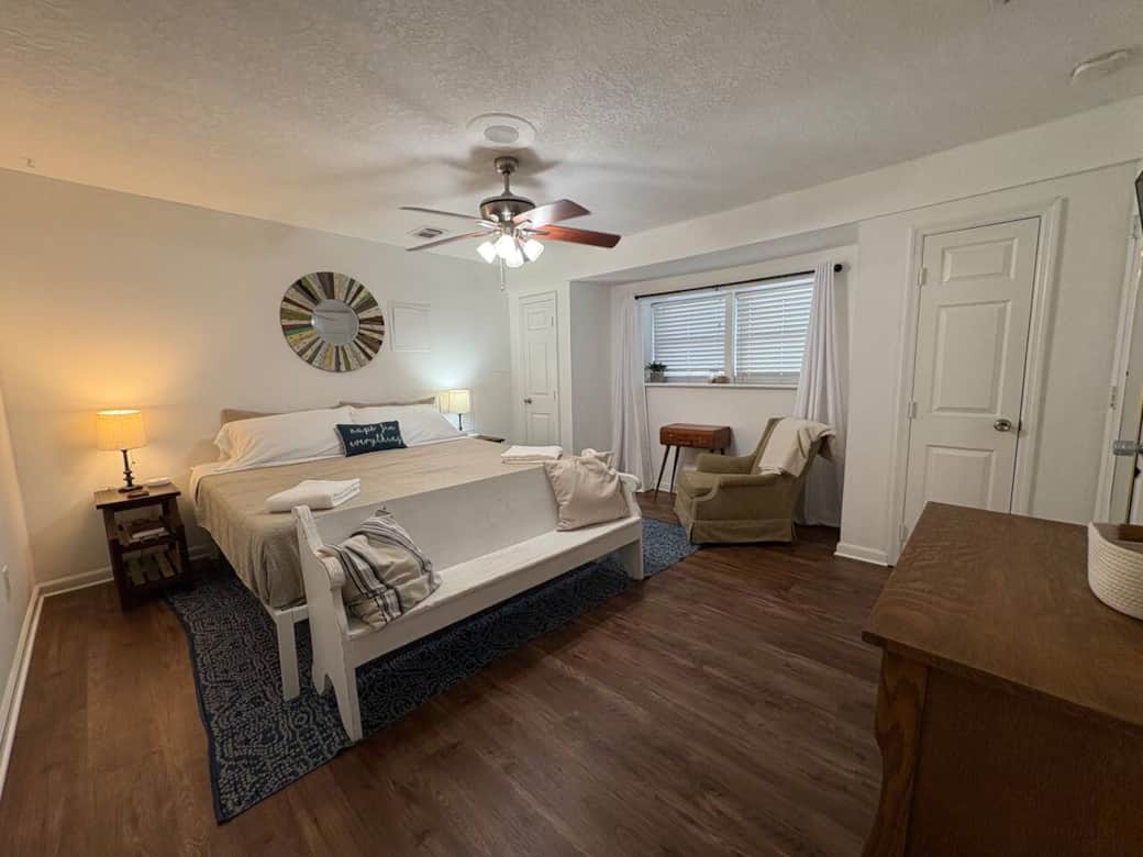 The spacious 3rd Bedroom (Lower Level) is just steps from the Kitchenette, 3rd Full Bath, and Laundry Room. And you basically have a "private entrance" via the Back Patio basement door. 