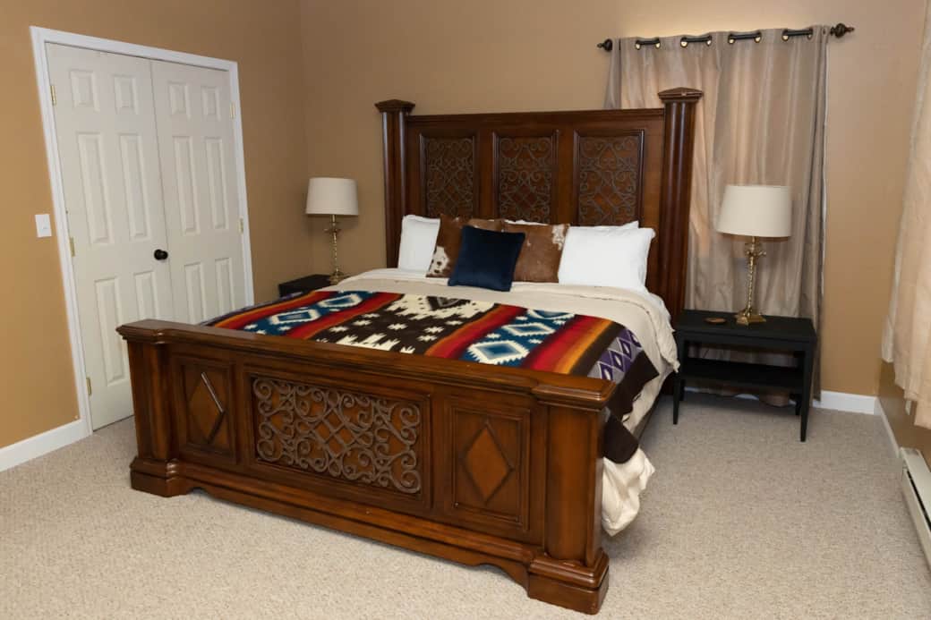 Bedroom 3 has a king sized bed, Roku equipped TV, and patio.