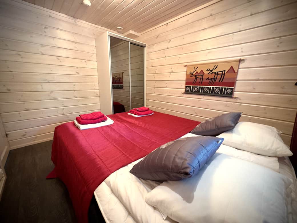 Bedroom with a kingsize bed and a wardrobe. Bedroom with a kingsize bed and a wardrobe.