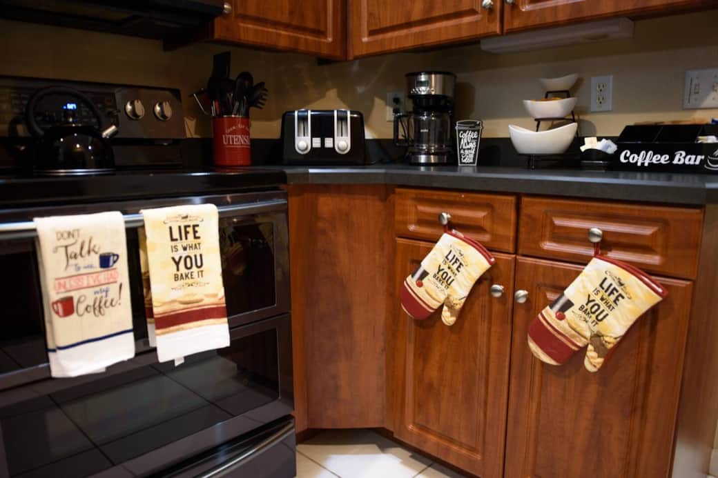 Fully stocked kitchen - equipped with dishwasher, microwave, coffee maker, tea kettle, pots and pans.