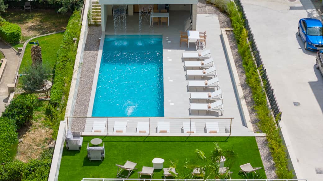 ALMISSUM Residences Pool and Garden Lounge View