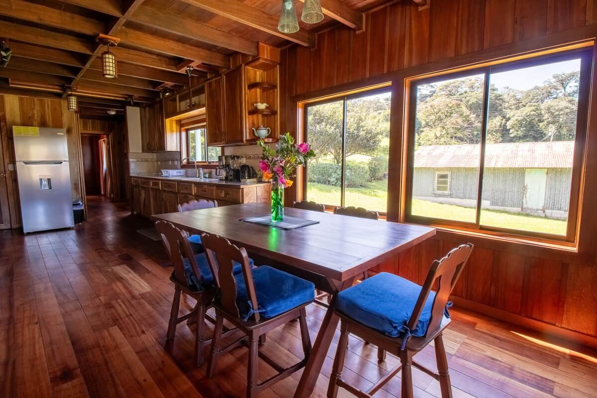 Spacious dining area next to the kitchen, perfect for family meals and gatherings.
