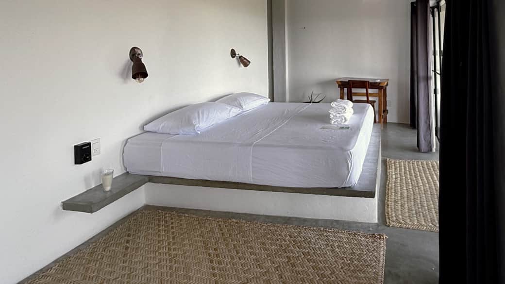 Cama King con vista al mar desde el balcón Cama King con vista al mar desde el balcón