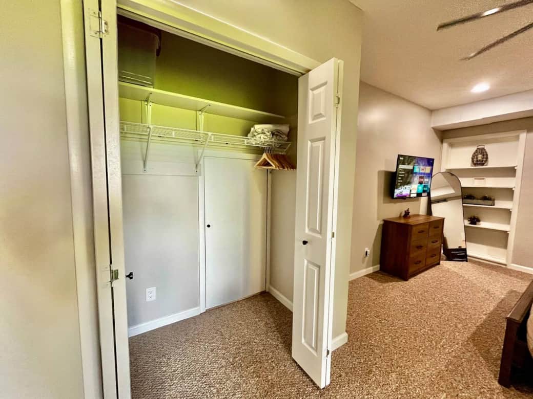 Large closet and dresser ensures no one is living out of their suitcase.