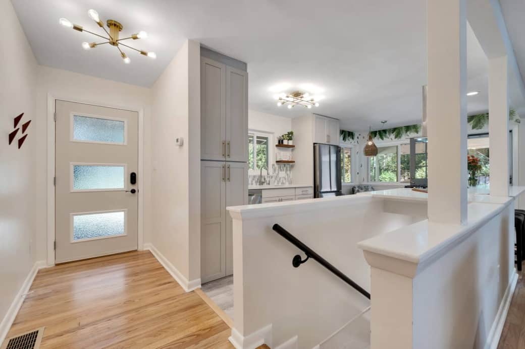 Entry. Tons of natural light floods the renovated kitchen. 