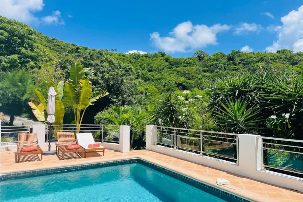 Pool with deck chairs Marina